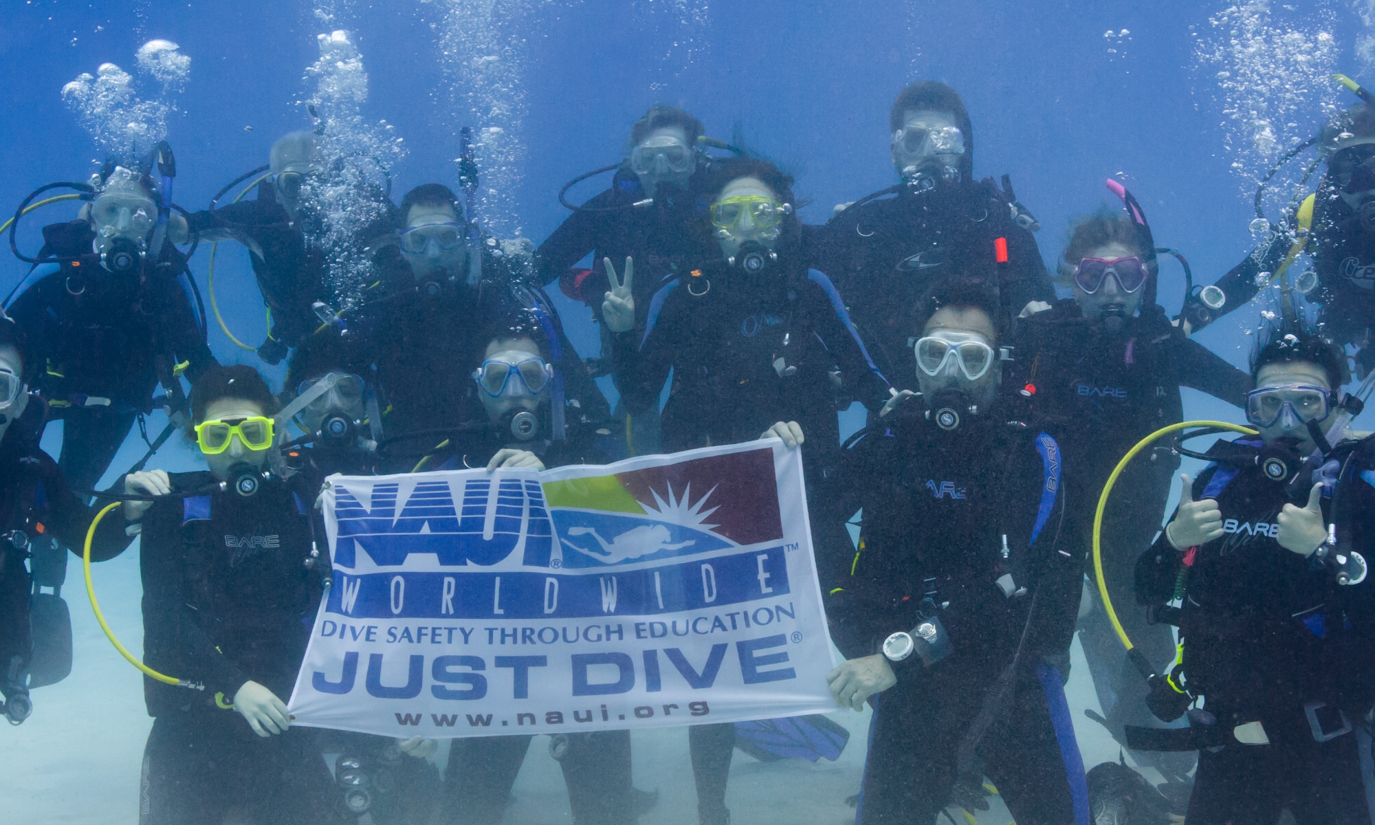 HHUC divers with NAUI banner