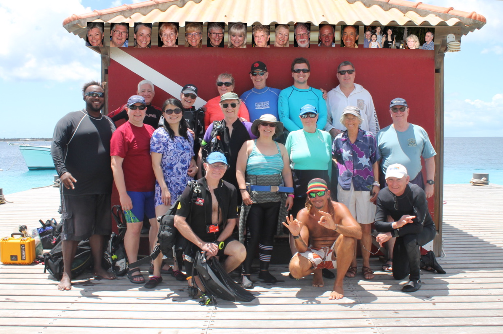 HHUC in Bonaire 2020: some of the divers on dock with the others in portrait under the roofline - photo credit: Bob Belcher, NAUI 3836